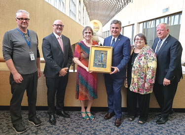 RCAS Donates Award-Winning Painting to Library