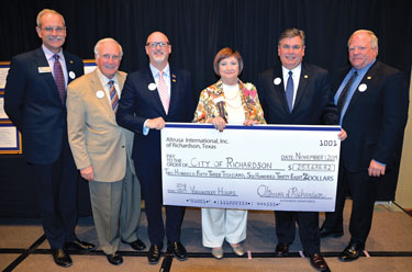 Altrusa Honors Local Women, Presents Symbolic Check