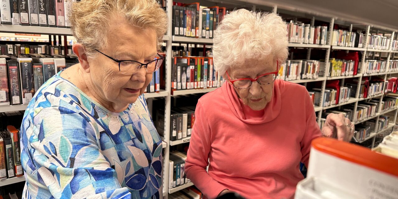 Volunteers Stay Young Through Work at Library