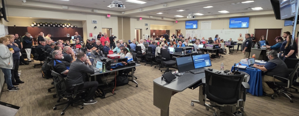 City staff sitting at tables during the annual emergency activation exercise