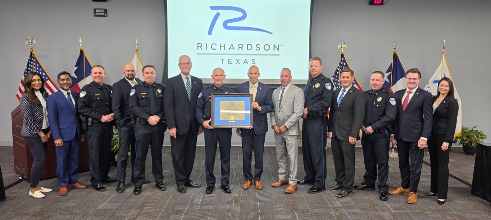 Richardson City Council members along with Richardson Police Officers posing for a photo