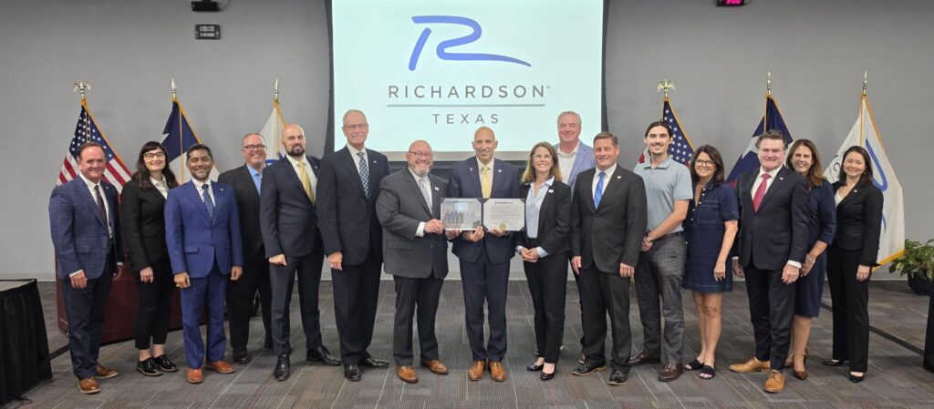 Richardson City Council members along with members of Richardson Chamber of Commerce posing for a photo